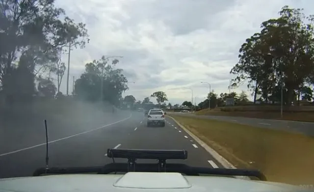 viewers baffled as car disappears in a cloud of smoke on the road while dri 17739