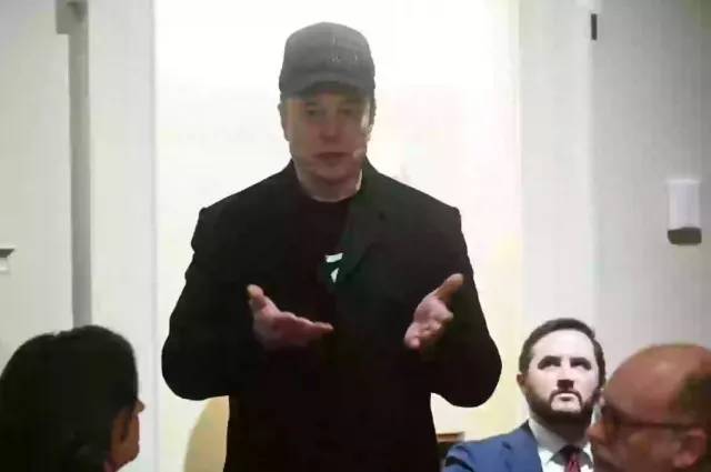 people point out one detail that stands out as donald trump holds his first 18238