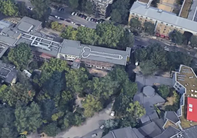 school forced to cover up 65-foot drawing visible on google maps 18281