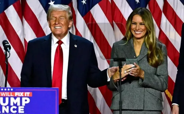 donald trump applauded for his kind gesture as melania stumbles in high hee 18638