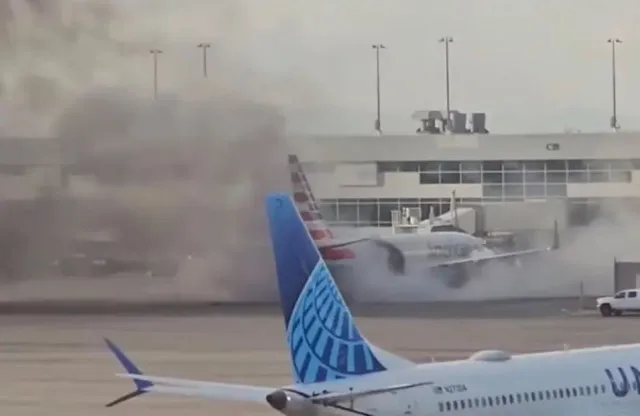 passengers stand on wing as they evacuate after plane bursts into flames at 19775
