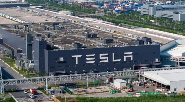 man arrested in molotov cocktail attack on tesla dealership also faces fede 20690