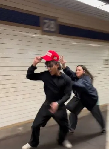 subway rider falls on camera after failed attempt to snatch maga hat 20737