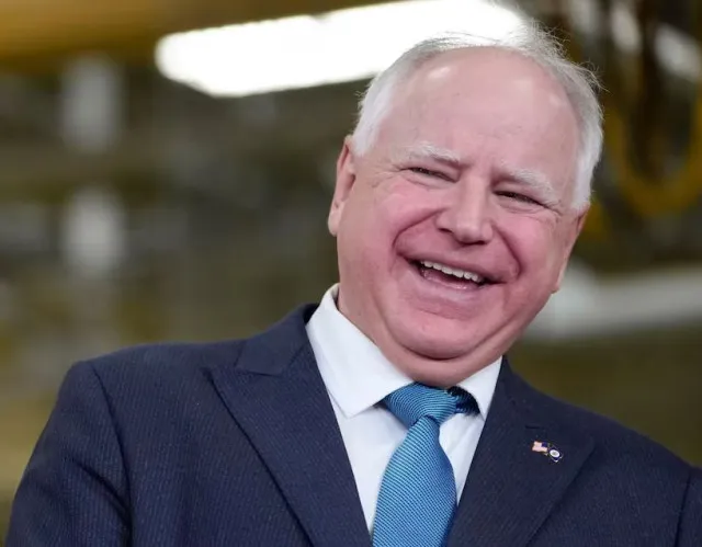 elon musk responds to tim walz after he mock teslas stock decline amid dog 20957