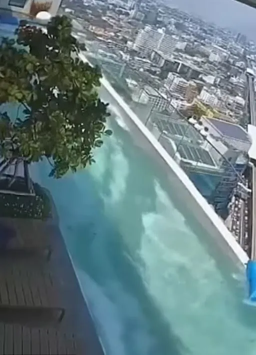 tourists scramble out of swaying infinity pool to avoid falling off skyscra 20968