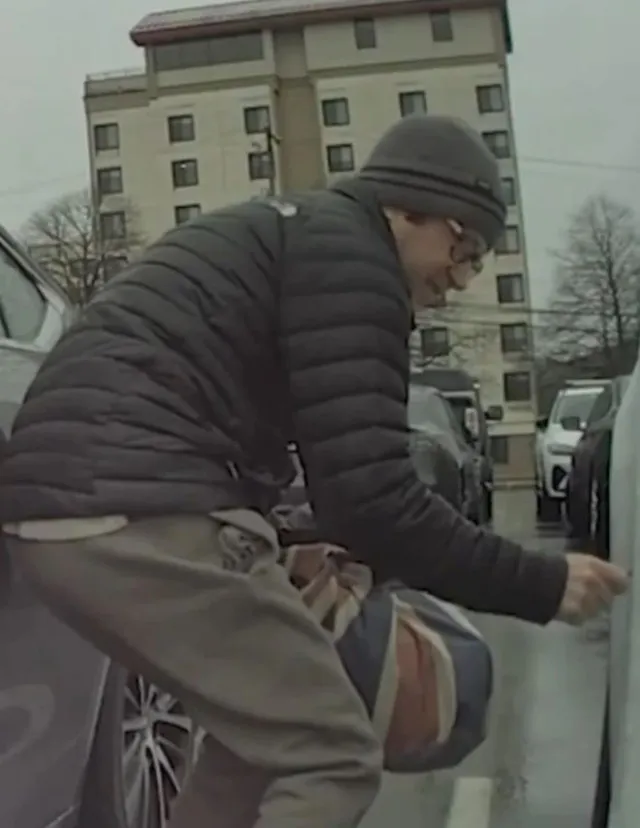 vandal arrested after tesla owner allegedly caught him scrawling a swastika 21022