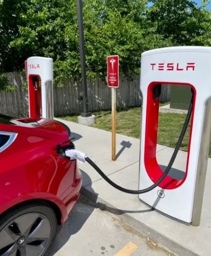 tesla owners place wet towels on supercharger handles to boost charge speed 21813