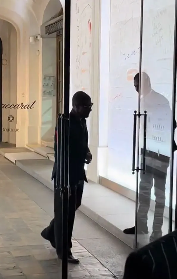 usher sparks backlash after showing him summoning a man to hold the door at 22480