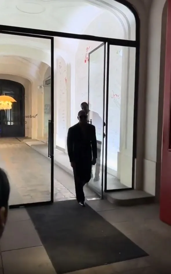 usher sparks backlash after showing him summoning a man to hold the door at 22478