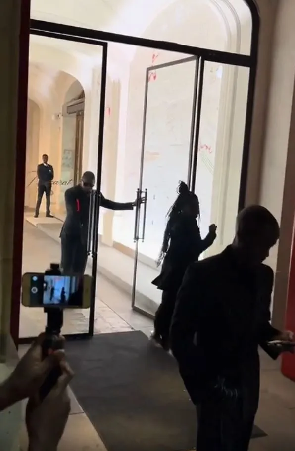 usher sparks backlash after showing him summoning a man to hold the door at 22481