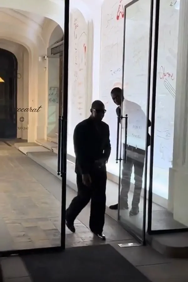 usher sparks backlash after showing him summoning a man to hold the door at 22479