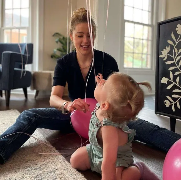 amber heard celebrates mothers day with the arrival of twins after moving 23869