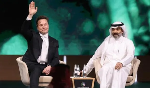 elon musk sparks debate after predicting ai could provide every person on e 24149