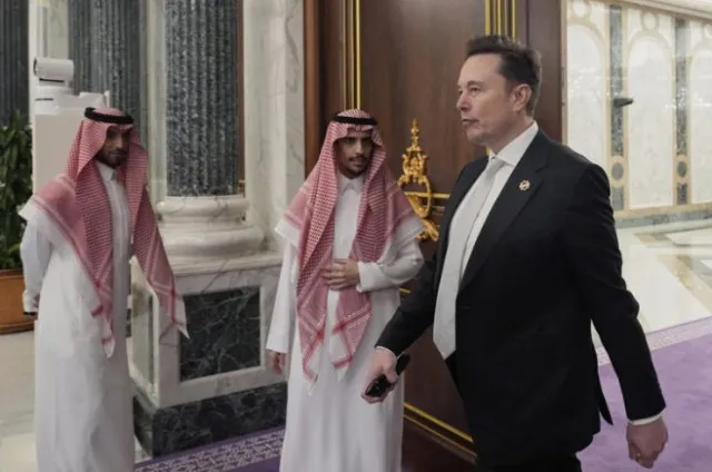 elon musk sparks debate after predicting ai could provide every person on e 24148