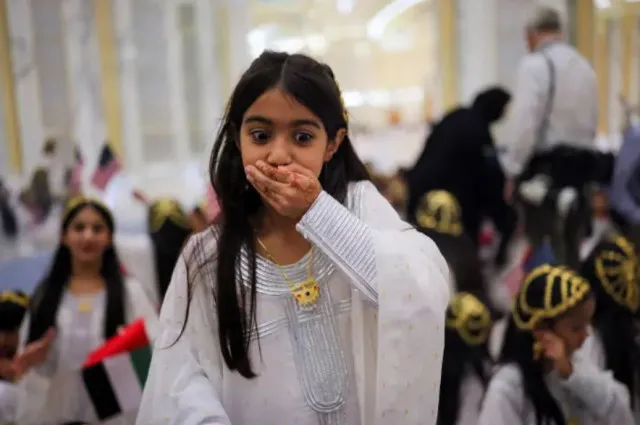 hair-flipping dancers and traditional rituals greet trump during uae visit 24238