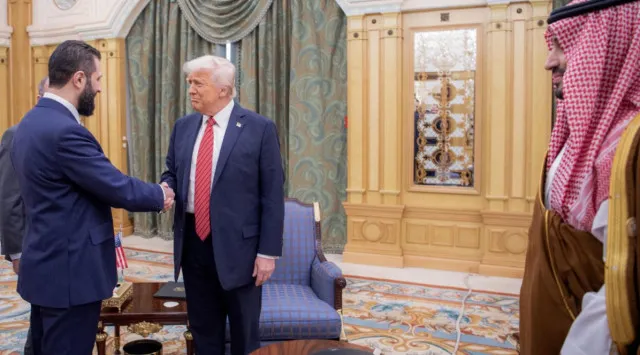 reason donald trumps handshake with syrias leader sparks global outrage a 24205