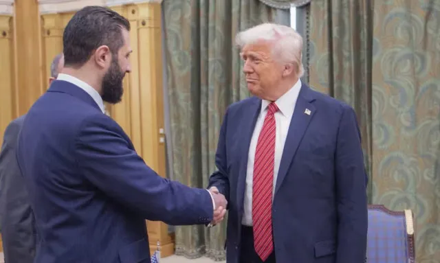 reason donald trumps handshake with syrias leader sparks global outrage a 24208