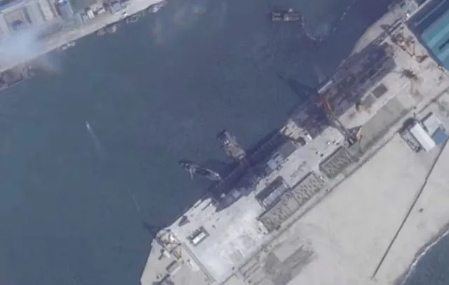 north korea covers warship with tarpaulin after humiliating launch failure 24677