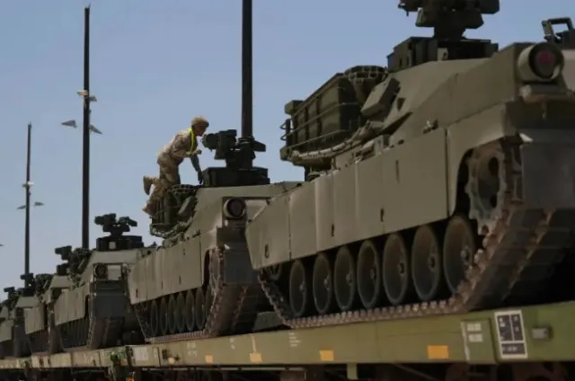 trump says tariff policy aims to boost tank production in the us instead of 24897